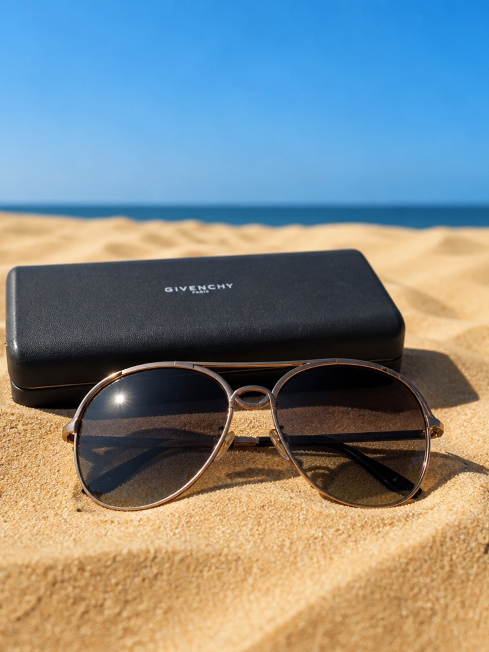 Givenchy womens Gold Frame Sunglasses with Black Gradient Lenses with COA